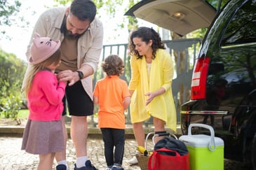 family packing for a spring break road trip